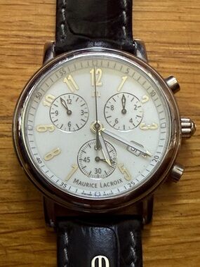 Maurice Lacroix White Dial Watch with Gold Accents and Black Strap